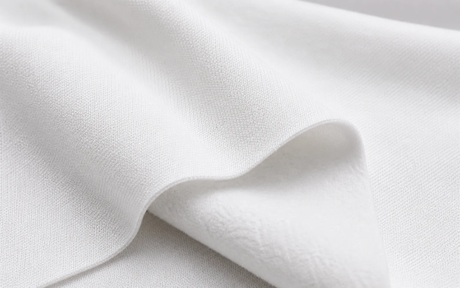 Tela Monarca blanca con fibra interior corta
